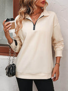 Trendsi women's dropped shoulder pullover top in beige with zip collar and relaxed fit