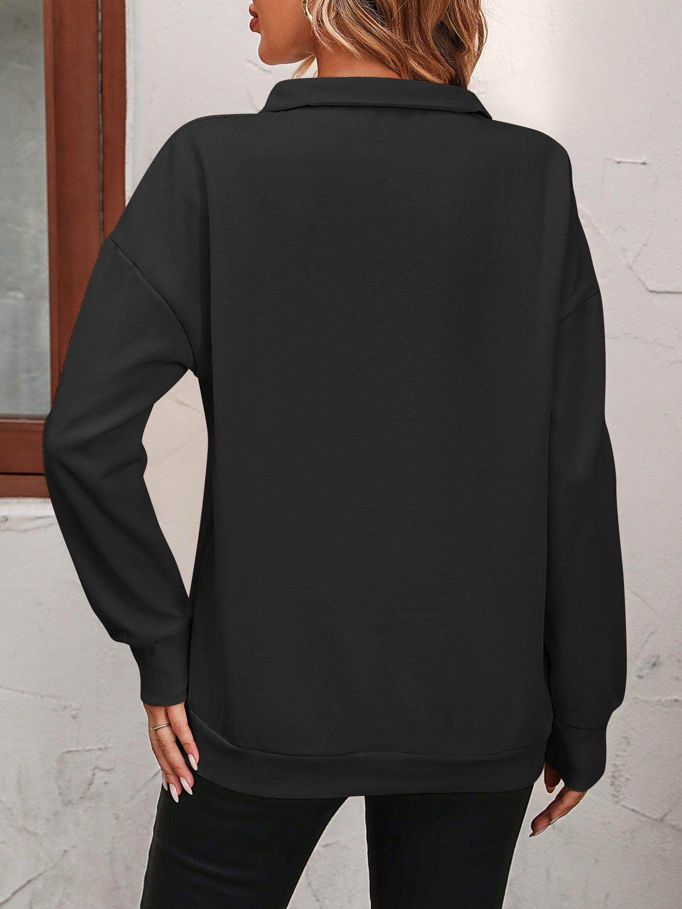 Trendsi Women's Black Dropped Shoulder Pullover Top for a Relaxed Fit and Casual Style