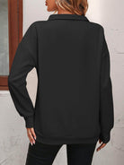 Trendsi Women's Black Dropped Shoulder Pullover Top for a Relaxed Fit and Casual Style
