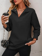 Trendsi Women's dropped shoulder pullover top in black with zip collar and relaxed fit