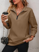 Trendsi dropped shoulder pullover top in brown with quarter zip and relaxed fit for casual style
