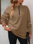 Trendsi Women's dropped shoulder pullover top in brown with half-zip and relaxed fit for casual style