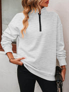 Trendsi Gray Dropped Shoulder Pullover Top with Zip Neck for Comfortable Everyday Wear