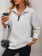 Trendsi women's dropped shoulder pullover top in grey with zip collar and relaxed fit