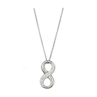 Silver infinity necklace with sparkling accents, perfect as elegant jewelry for vacation outfits