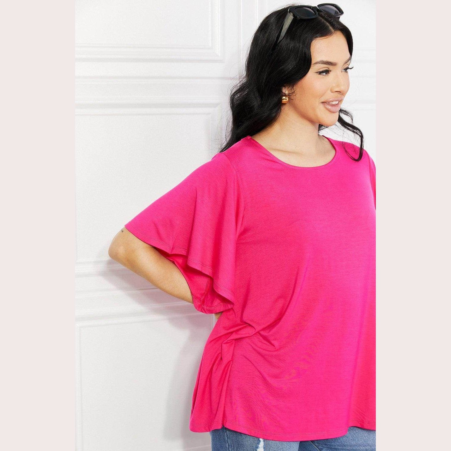 Trendsi elegant pink top featuring soft fabric and relaxed fit, perfect for casual outings