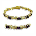 Elegant vacation jewelry for women featuring a gold bracelet with purple stones and sparkling accents