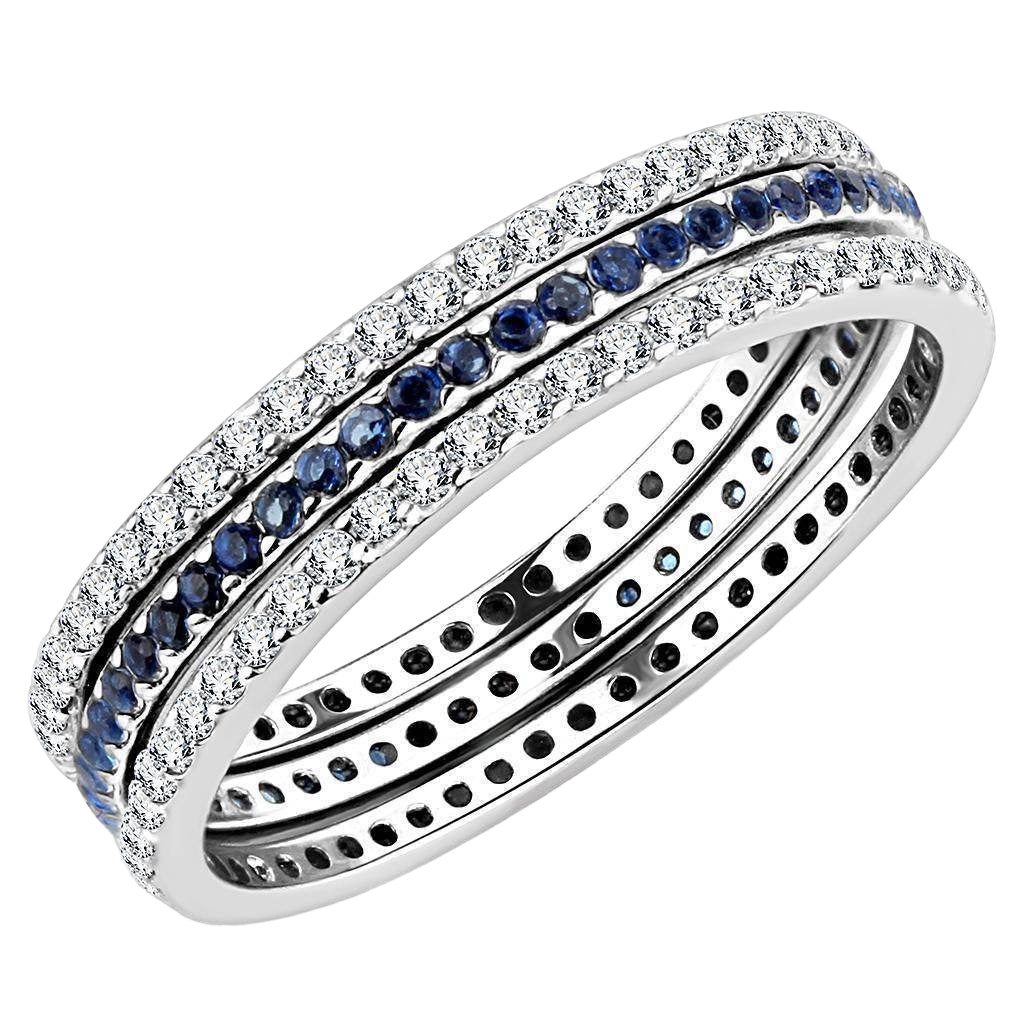 Elegant women's eternity band with blue stones and shimmering white gem accents for a stylish look