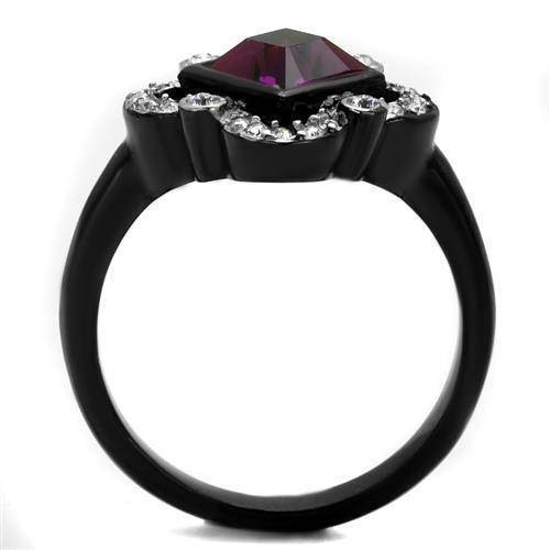 Elegant black fashion jewelry for vacations featuring a large purple gemstone and sparkling accents