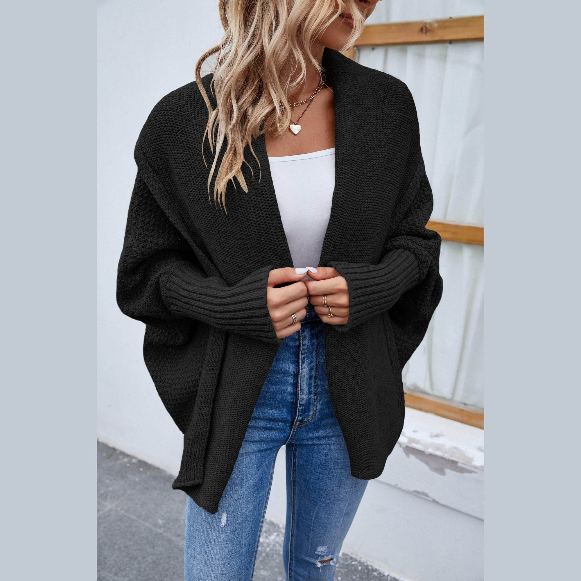 Trendsi stylish travel cardigan in black with oversized fit and ribbed sleeves, perfect for on-the-go fashion