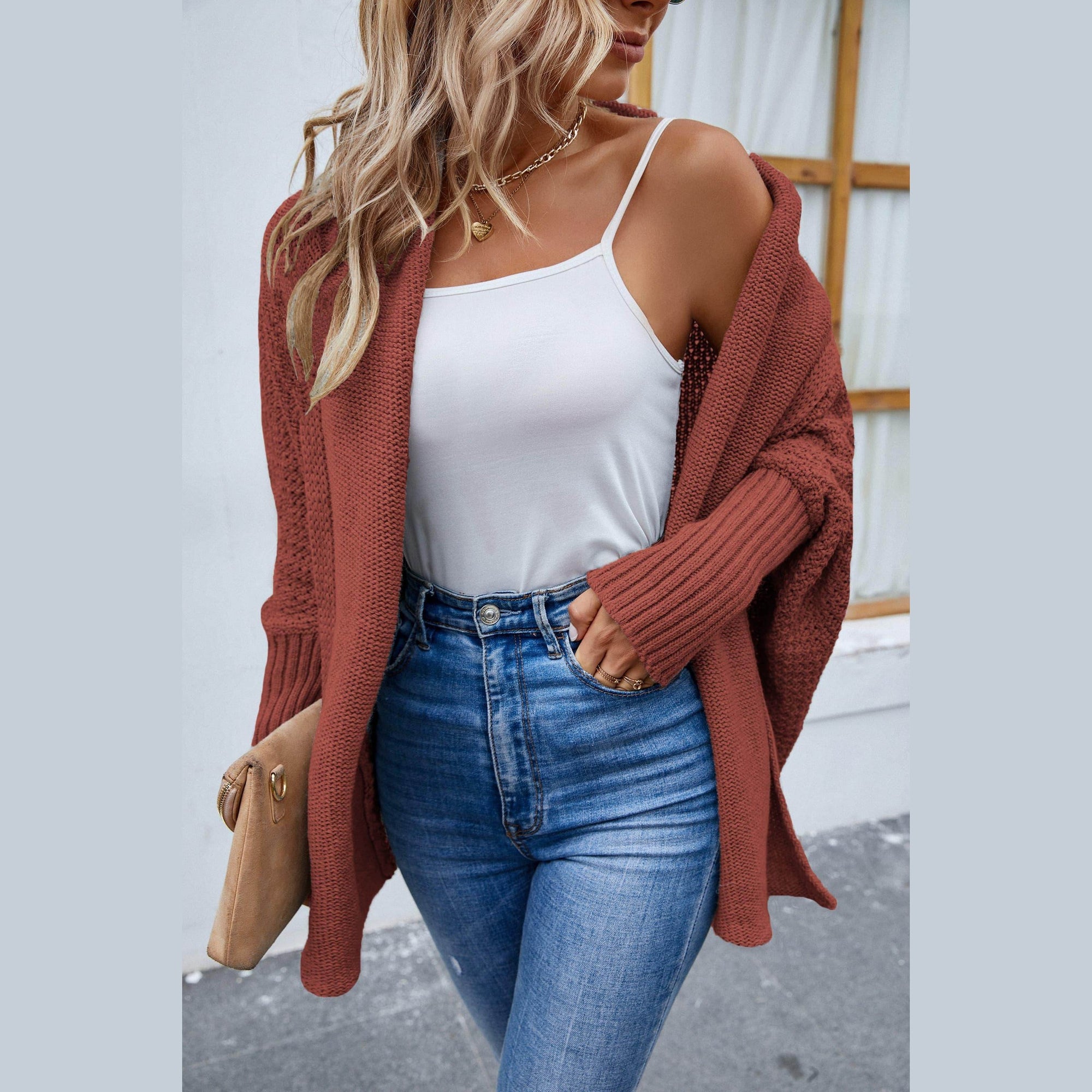 Chic rust colored stylish travel cardigan for women, perfect for layering and comfort while on the go