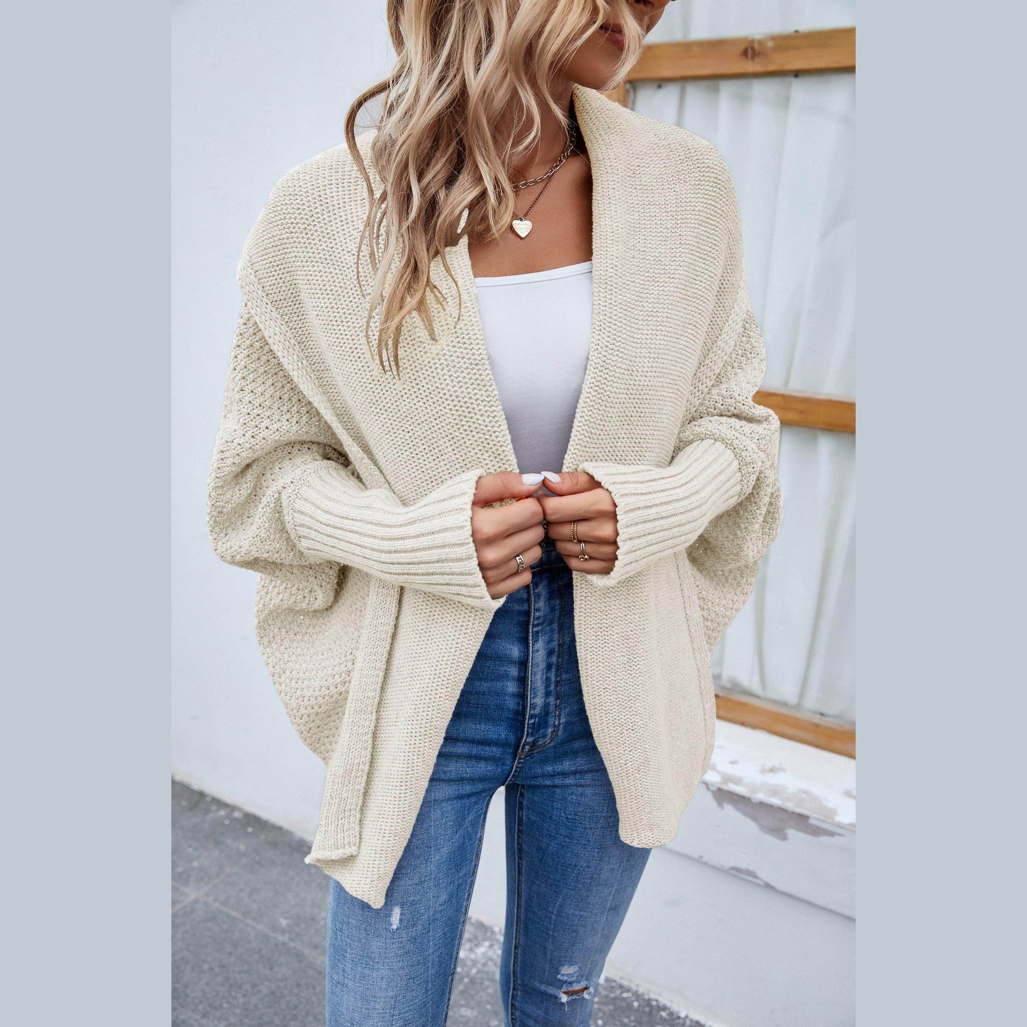 Trendsi stylish travel cardigan in light beige, featuring a cozy oversized design for comfort on the go