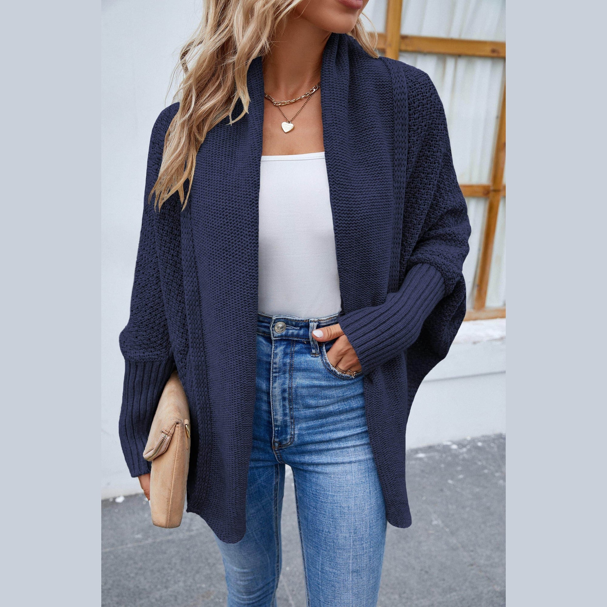 Trendsi stylish travel cardigan in navy blue, perfect for layering over outfits while on the go