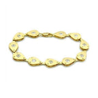 Gold bracelet with teardrop design and gemstones, perfect fashion vacation jewelry for women