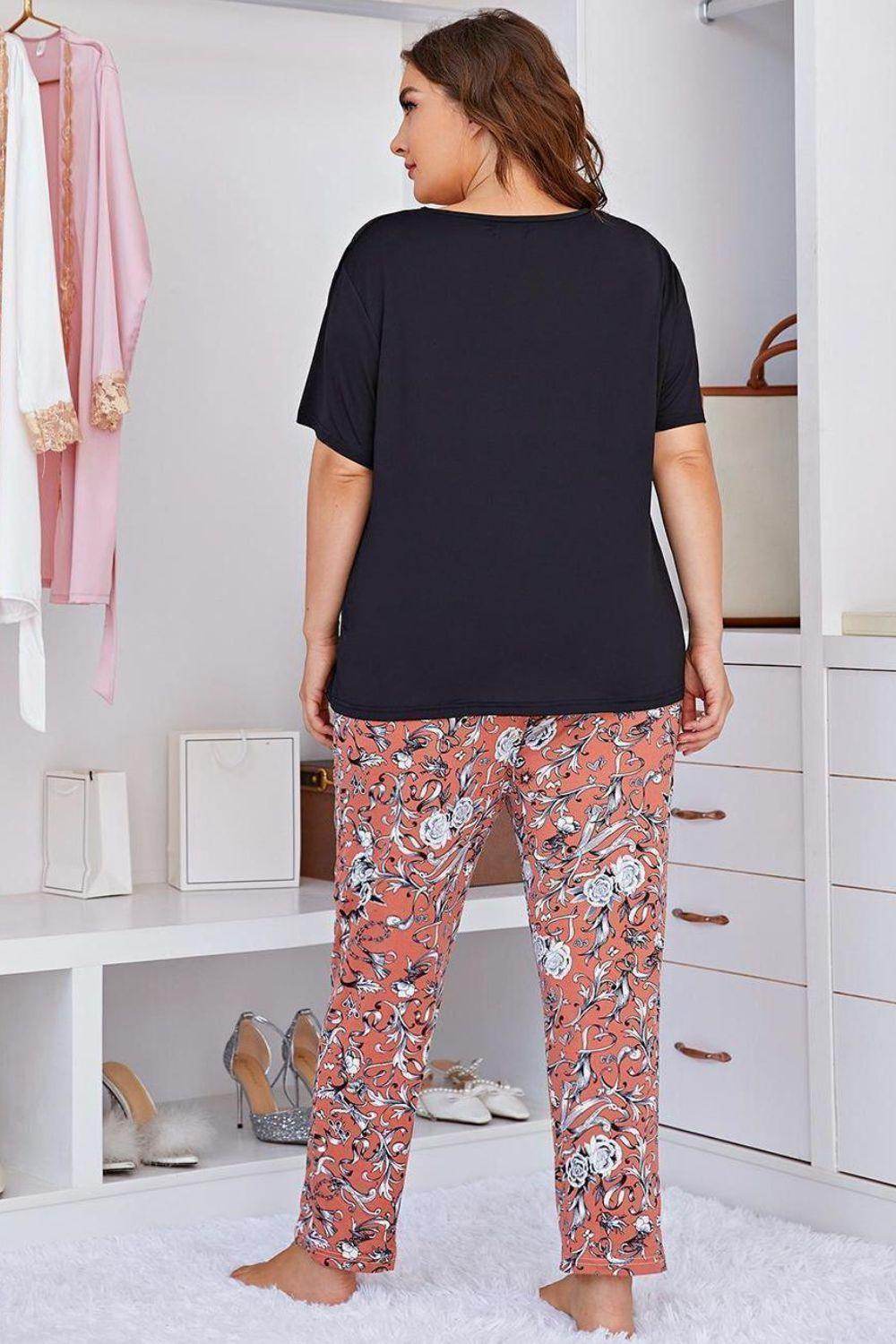 Trendsi floral pants set for women featuring a comfortable black top and elegant floral pattern pants