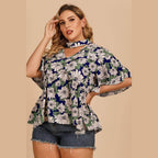 Trendsi women's plus size flutter sleeve floral top in navy with a vibrant flower print