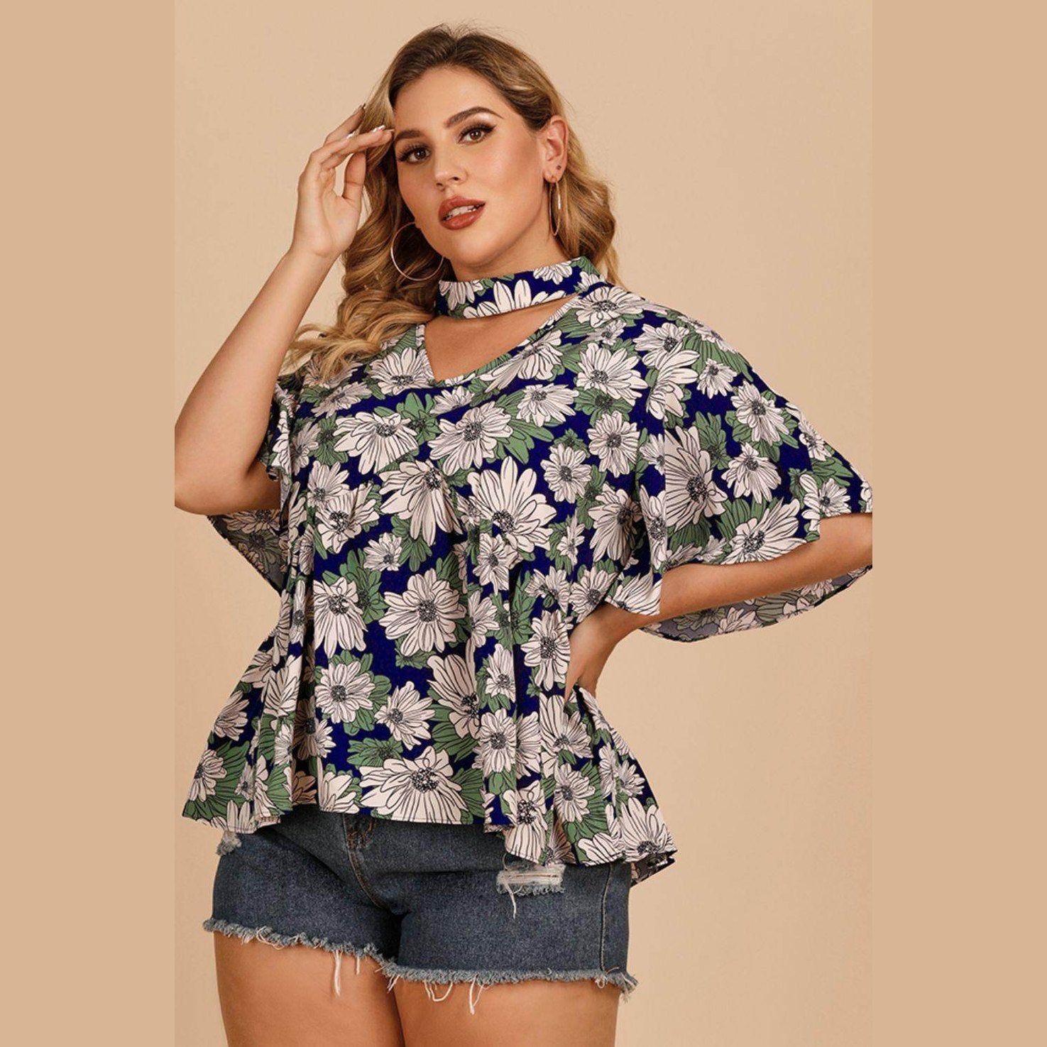 Trendsi women's plus size flutter sleeve floral top in navy with a vibrant flower print