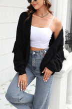 Trendsi women's black fringe trim cardigan paired with a white crop top and high-waisted jeans