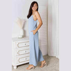 Trendsi stylish full size summer jumpsuit in light blue with adjustable straps and pockets