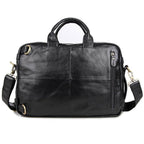 Genuine leather black briefcase with multiple pockets and adjustable shoulder strap for professional use