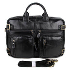 Genuine leather black briefcase with multiple zippered pockets and a detachable shoulder strap