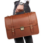 Genuine leather business bag in brown carried by a man in formal attire with a watch