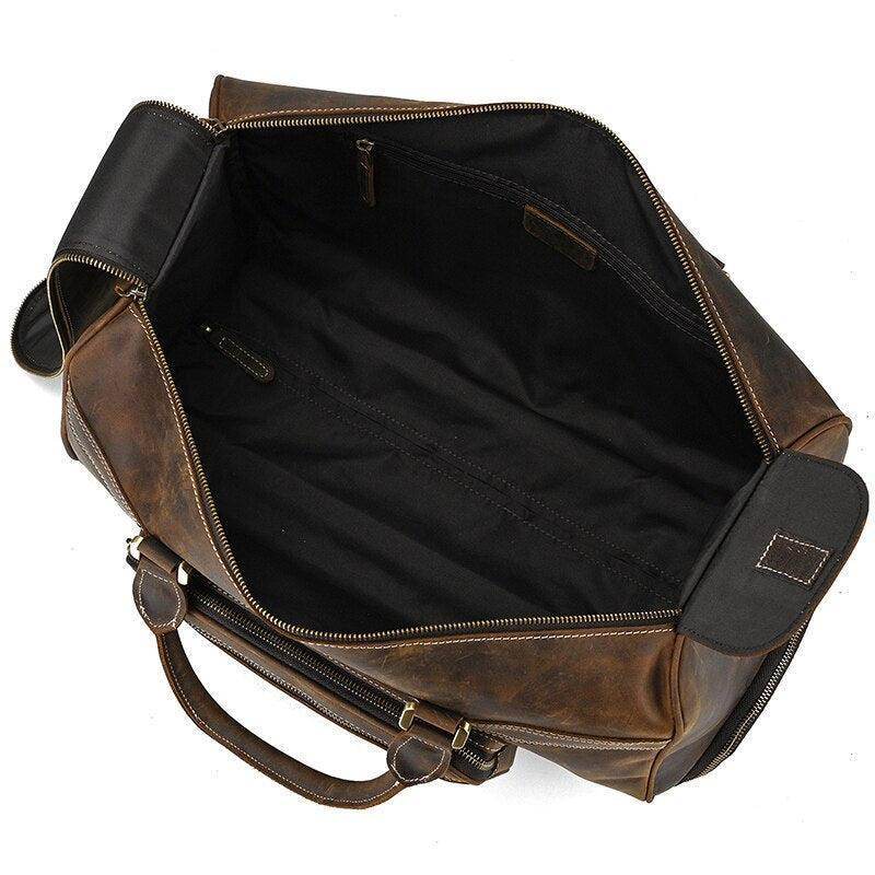 Genuine leather luggage bag by VacationGrabs with spacious interior and strong handles