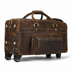 Genuine leather luggage bag with wheels and front zipper pocket for easy travel convenience