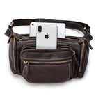 Genuine leather waist bag in brown with multiple zippered pockets for securing essentials