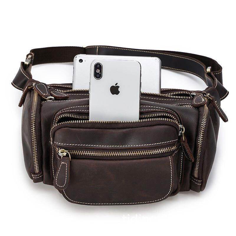 Genuine leather waist bag in brown with multiple zippered pockets for securing essentials