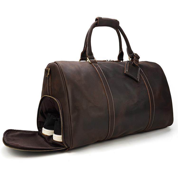Genuine leather weekender bag with a spacious main compartment and dedicated shoe compartment for travel