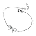 Delicate rhodium bracelet featuring a bow design, perfect as a gift for her rhodium bracelet