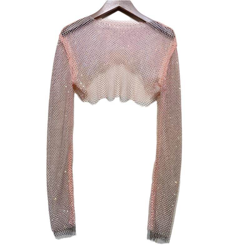 Stylish women's glitter crop top in sheer fabric, perfect for clubwear and night outings
