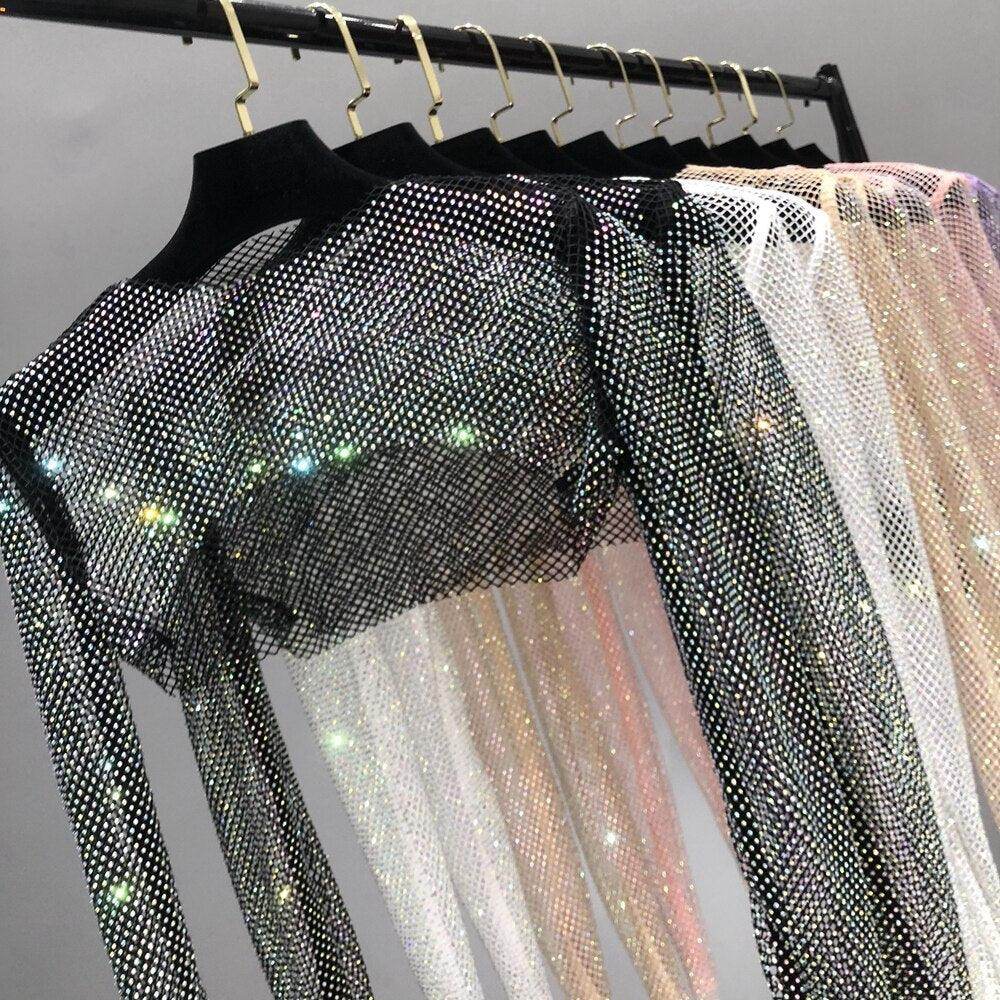 VacationGrabs glitter crop top on hangers in various colors perfect for women's clubwear