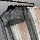 VacationGrabs glitter crop top on hangers in various colors perfect for women's clubwear