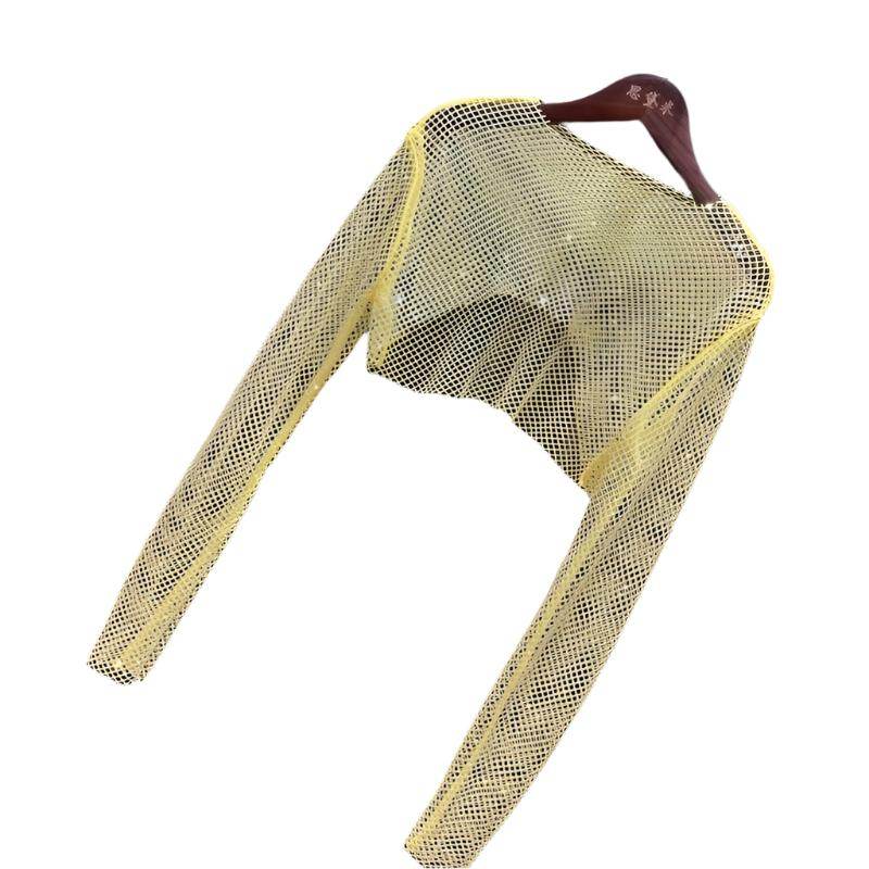 Yellow glitter crop top for women's clubwear with mesh design for a trendy night out