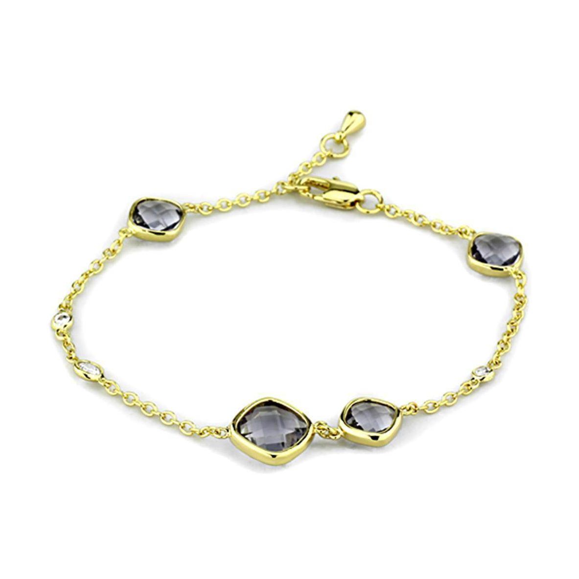 Elegant gold brass bracelet with synthetic glass gemstones, perfect for stylish outfits