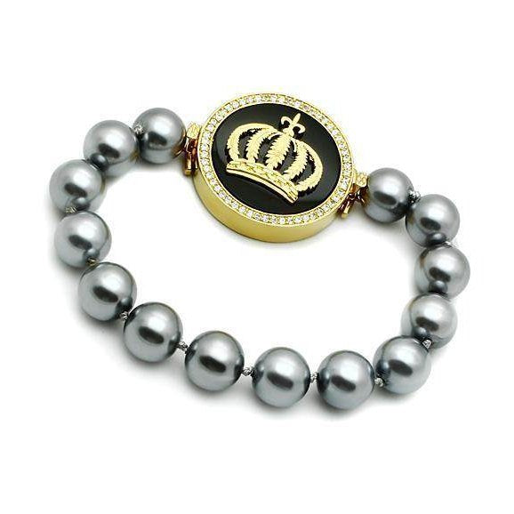 Gold brass crown bracelet featuring a stunning crown emblem and elegant gray beads