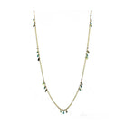 Gold brass necklace for women with dangling green and blue charms for a stylish touch