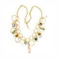 Gold brass necklace with CZ stones featuring colorful circular accents and a teardrop pendant