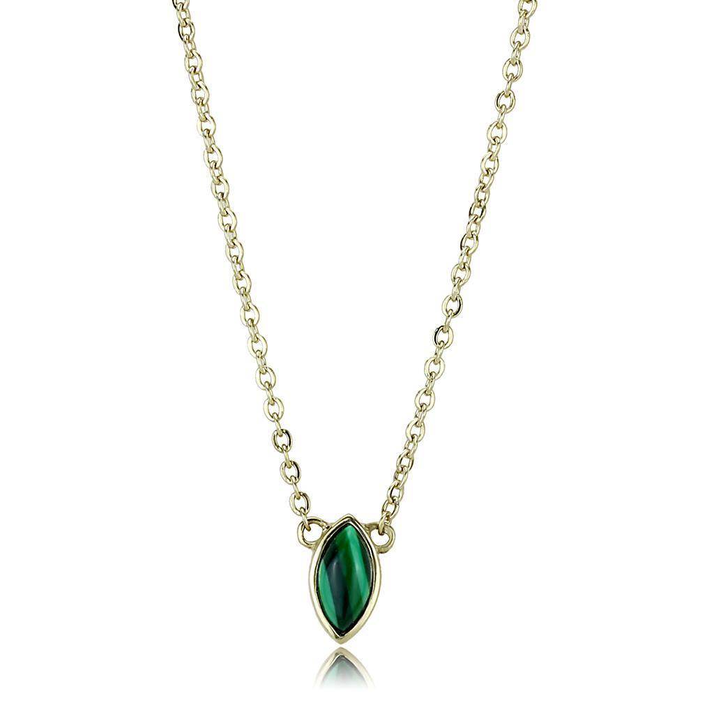 Gold chain necklace with green pendant featuring an elegant marquise-cut design