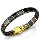 Stylish gold ion plated women's bracelet with black and gray ceramic tiles for a trendy look