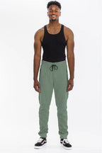 Comfortable heathered sweatpants for men in green with an adjustable waistband and pockets