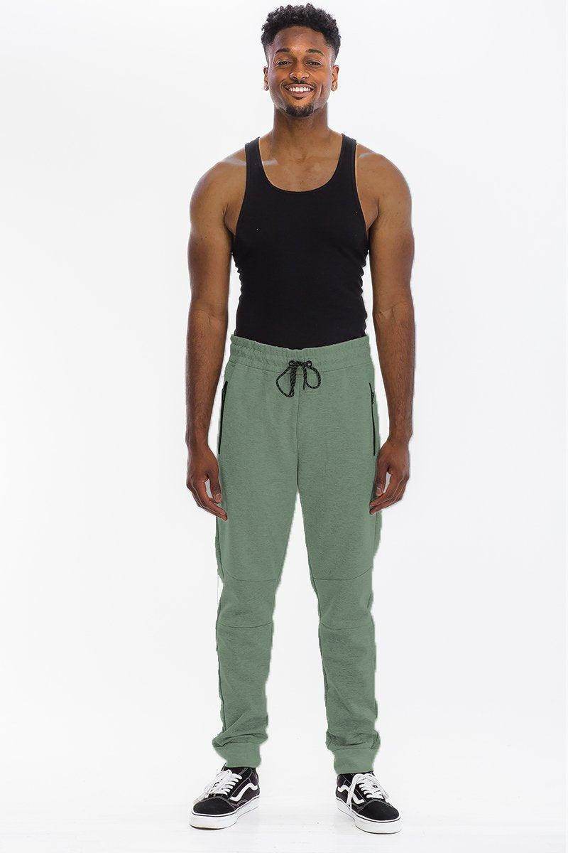 Comfortable heathered sweatpants for men in green with an adjustable waistband and pockets