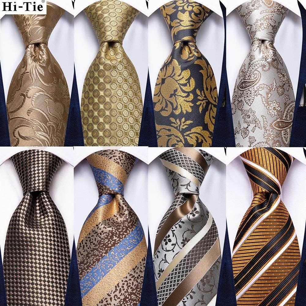 Collection of men's ties featuring a gold paisley formal tie among elegant designs and patterns
