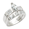 High polished silver engagement ring featuring a marquise-cut stone and elegant rectangular gems