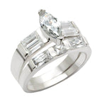 High polished silver engagement ring featuring a marquise-cut stone and elegant rectangular gems