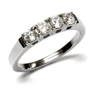 Elegant high polished stainless steel ring featuring four sparkling stones for a stunning look