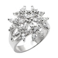 High polished sterling silver ring featuring a floral design with sparkling gemstones
