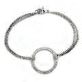 Stylish high polished women's bracelet with a sparkling circular centerpiece in silver tone